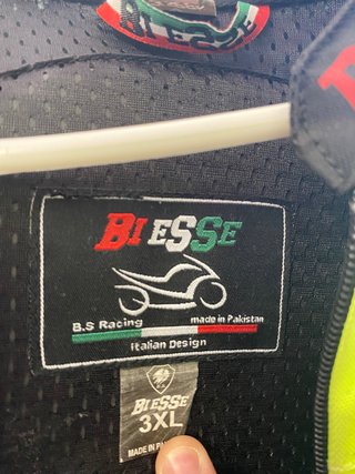 Mono de moto BIESSE negro y flúor