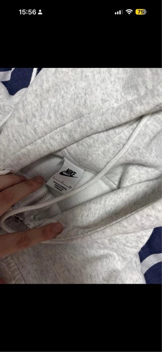Chaqueta Nike gris con cremallera