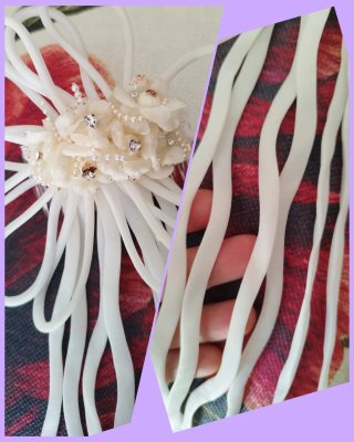 Acconciatura sposa fiori e nastri