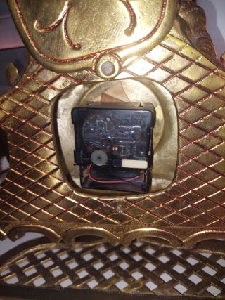 Reloj de sobremesa de bronce antiguo