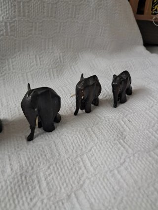 4 elefantes de madera decorativos