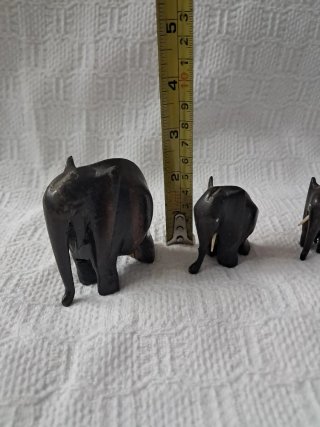 4 elefantes de madera decorativos