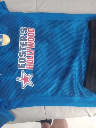 Conjunto deportivo negro Macron