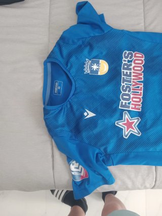 Conjunto deportivo negro Macron