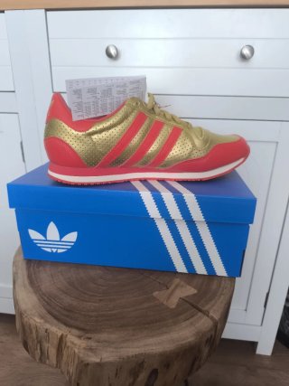 Adidas Galaxy Talla 45 Oro Rojo.