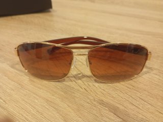 Gafas de sol polarizadas Ferrari doradas .(CAMBIO)