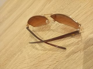 Gafas de sol polarizadas Ferrari doradas .(CAMBIO)
