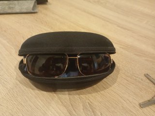 Gafas de sol polarizadas Ferrari doradas .(CAMBIO)