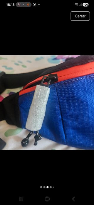Riñonera Guess juvenil azul, naranja y negro