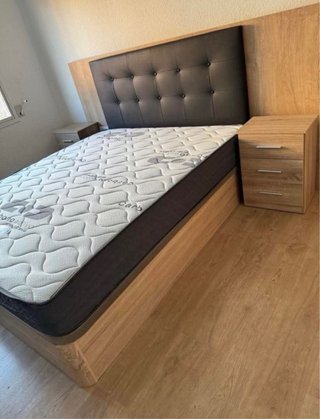 Cama canapé con cabecero tapizado