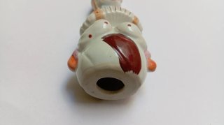 Figura vintage payaso acordeón
