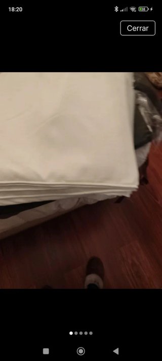 Cortinas blancas con bajo hecho con peso en los ba