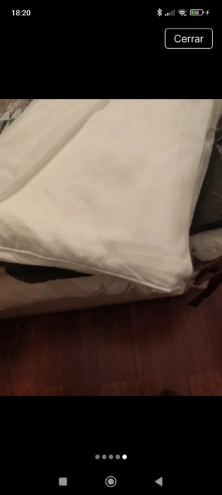 Cortinas blancas con bajo hecho con peso en los ba