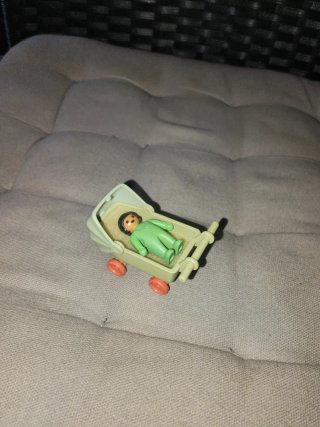 Carrito de bebé Playmobil con muñeco
