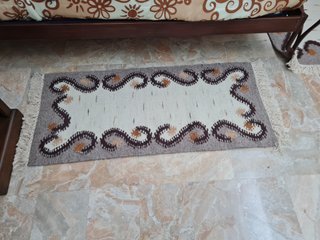 Tappeti in lana beige e marrone