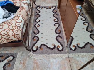 Tappeti in lana beige e marrone