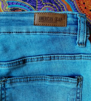 Bermuda jeans bambino strappati