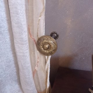 Ferma tenda decorativa in metallo dorato