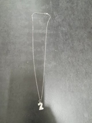 Cadena y colgante de plata con número 7