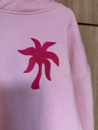 Sudadera rosa con palmera y concha