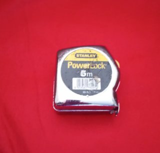 Machota, cincel y cinta métrica