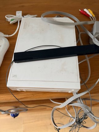 Nintendo Wii con 2 mandos y juegos