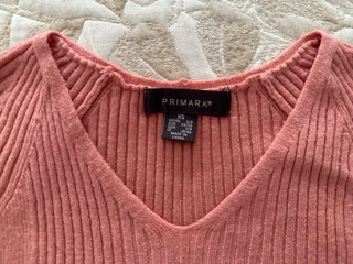 Jersey rosa cuello pico Primark