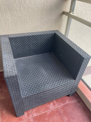 Silla de exterior con cojín verde