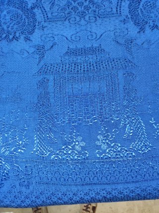 Colcha antigua azul motivos orientales.