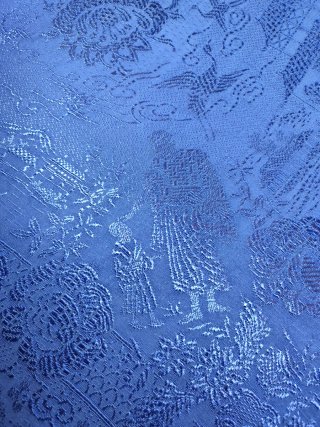 Colcha antigua azul motivos orientales.