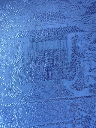 Colcha antigua azul motivos orientales.