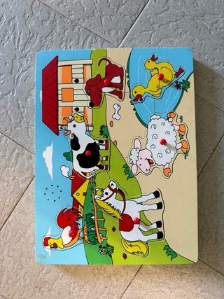 Puzzle de madera con ovejas y sol