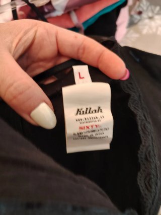 Top nero pizzo e fiocco