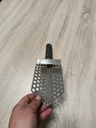 Pala detector metales con mango