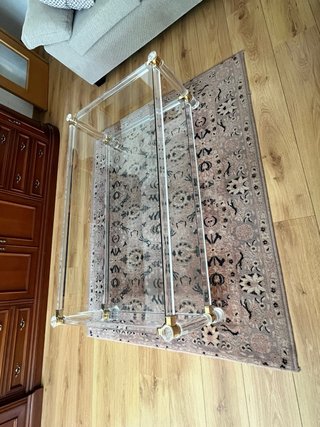Mesa de centro cristal y metal dorado