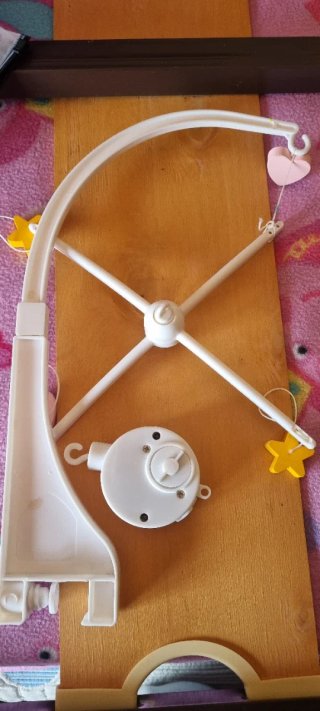 Patinete morado infantil y carrusel