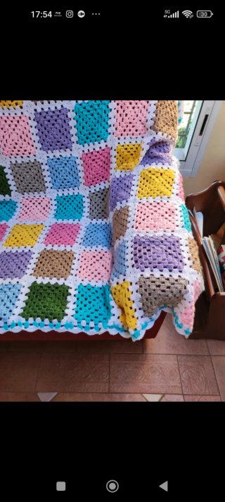 Manta de ganchillo . Funda de sofa