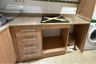 Mueble de cocina con encimera de granito