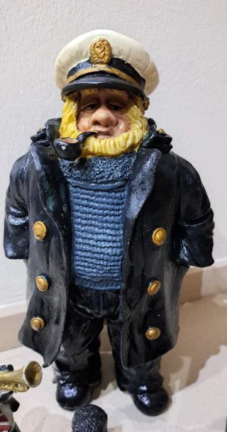 Figuras de músicos y capitán
