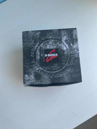 Reloj Casio G-Shock Blanco y Plateado