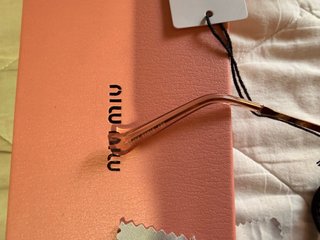 Gafas Miu Miu Doradas y Rosas