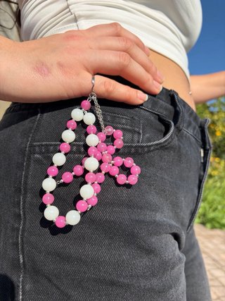 Portachiavi perline vetro fiocco rosa bianco