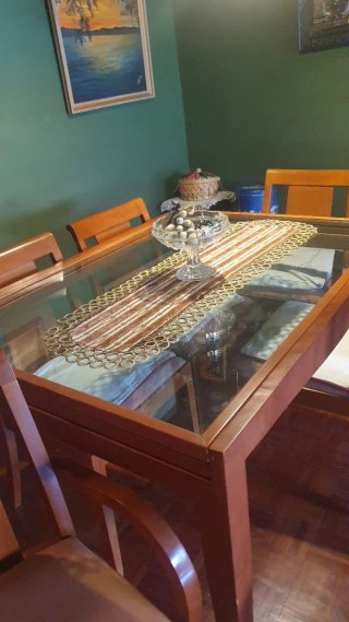 Mesa de comedor de cristal y madera extensible
