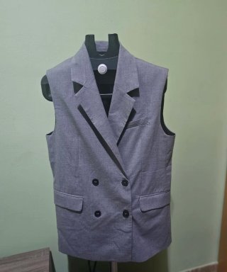 Blazer sin mangas gris talla M