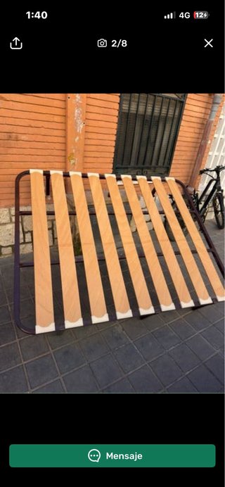 Cama individual metálica con somier de madera