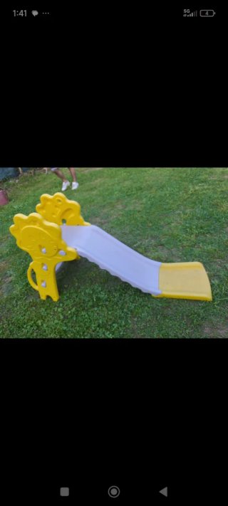 Tobogán infantil amarillo y blanco