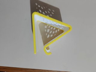 Supporto per telefono bianco e giallo