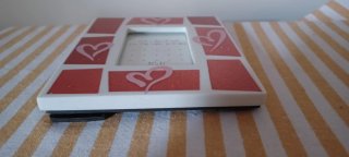 Cornice portafoto glitterata con cuori