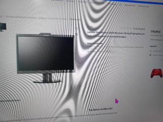 Volante Logitech G27 con soporte y 2 monitores.