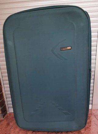 Maleta grande azul con ruedas